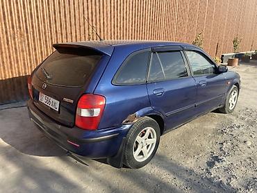 mazda 7: Mazda 323: 2001 г., 1.6 л, Автомат, Бензин, Хэтчбэк — 5