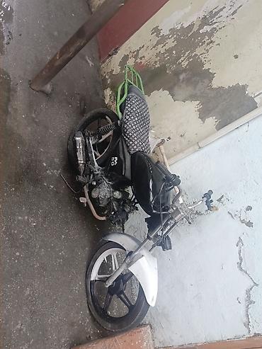 Motonəqliyyat: Motoriklet — kiçik həcmli, şəhərdaxili gediş-gəliş və çatdırılma üçün — 2