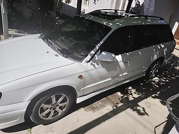 машиа: Subaru Legacy: 2002 г., 2.5 л, Автомат, Газ, Универсал — 2