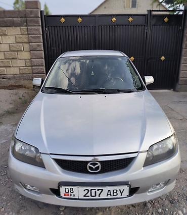 Mazda: Mazda Familia: 2004 г., 2 л, Кол менен иштөөчү, Газ, Хетчбек — 6