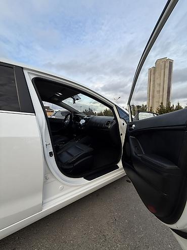 Kia: Kia K3: 1.6 l | 2014 il Sedan — 11