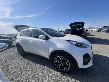 киа спортэч: Белый кроссовер Kia Sportage с панорамной крышей и черными глянцевыми
