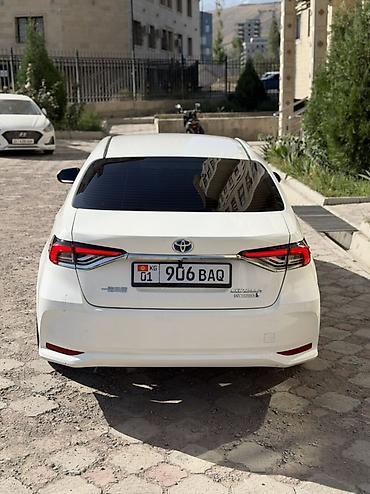 е39 фара: Toyota Corolla: 2023 г., 1.8 л, Автомат, Гибрид, Седан — 5