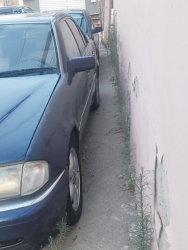 mersedes a klas: Mercedes-Benz C-Sinif sedan (W202), tünd mavi rəng. - Kuzov: 4 qapılı — 4