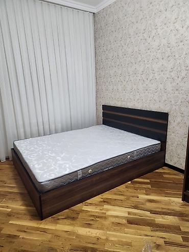 Çarpayılar: İki nəfərlik taxta çarpayı və döşək dəsti - Ölçü: təxminən 160x200 sm — 1