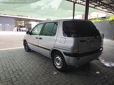 машиный: Toyota Raum: 1998 г., 1.5 л, Автомат, Бензин, Хэтчбэк — 9