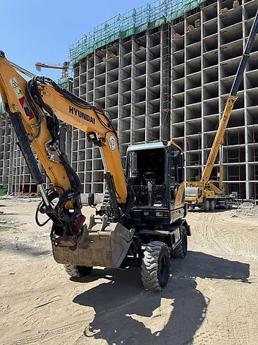 мини погрузчик bobcat цена: Экскаватор, Hyundai, Колесный — 2