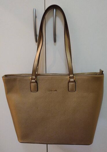 Tašne: Nova Avon torba, vrlo elegantna i kvalitetna. Razlog prodaje je nije
