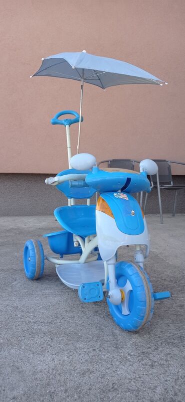 kolica za bebu: Kupljena u mogly toys-u,ocuvana,ima i decije pesmice,radi na