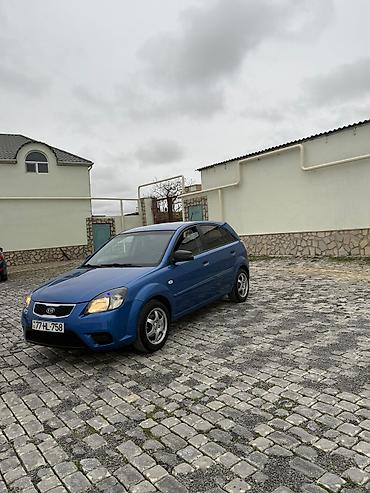 Kia: Kia Rio: 1.4 l | 2009 il Hetçbek — 2