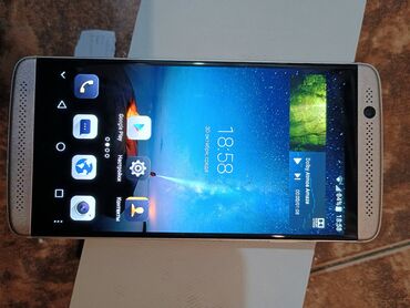 en ucuz telfonlar: ZTE Axon 7 Mini, 32 GB, rəng - Qızılı, Sensor, Barmaq izi, Sənədlərlə