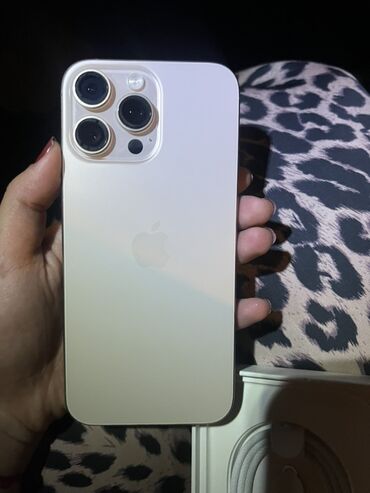 qabyuyan aliram: IPhone 16 Pro Max, Desert Titanium