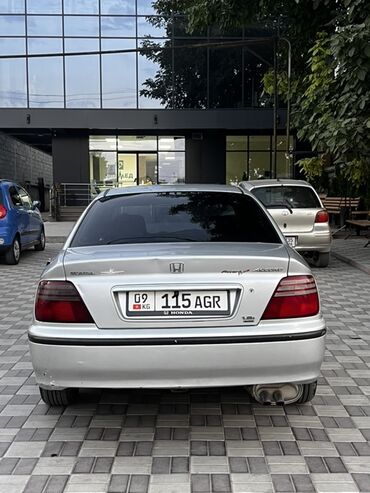 диски разноширокие: Автомобиль Honda Accord, выполненный в серебристом цвете, представляет