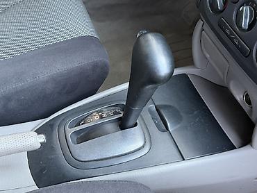ex 5: Mazda Familia: 2003 г., Автомат, Бензин, Хэтчбэк — 6