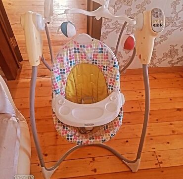 1 yaşdan yuxarı uşaqlar üçün velosipedlər: Graco elektrikli beşik-salıncaq - Uşaqlar üçün elektrikli