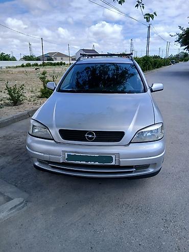opel astra xectbek: Opel Astra Caravan (Universal) – gümüşü rəng Xüsusiyyətlər: - Kuzov — 2