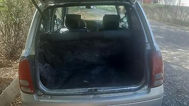Daihatsu: Daihatsu Cuore: 2002 г., 1 л, Механика, Бензин, Хэтчбэк — 4