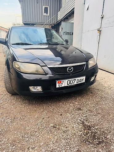 мазда 323 фк: Mazda 323: 2002 г., 1.6 л, Автомат, Бензин, Хэтчбэк — 1