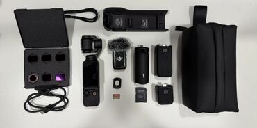 mikrafon tutacağı: DJI Osmo Pocket 3 Creator Combo kamera dəsti. Bu dəstə DJI Osmo Pocket
