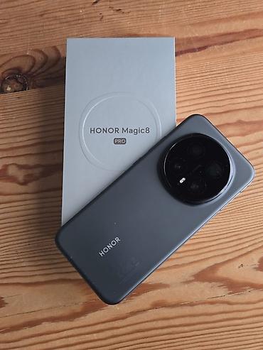 magic 4 pro: Honor Magic 8 Pro, 256 GB, rəng - Qara, İki sim kartlı, Face ID, Sənədlərlə — 1