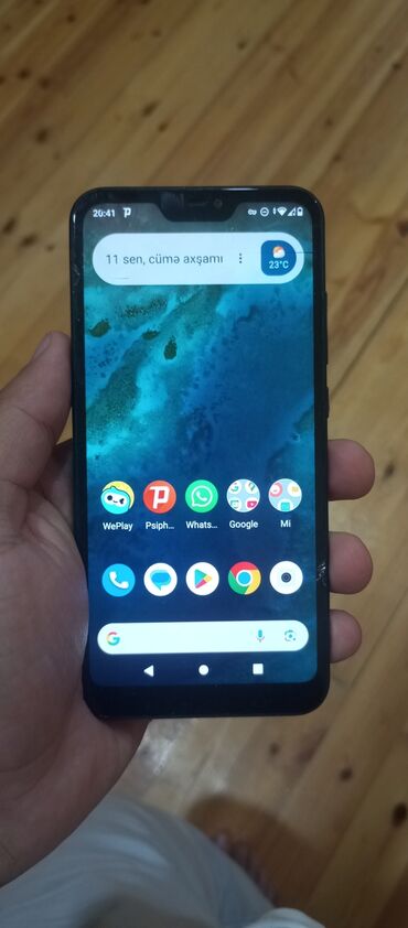 Информатика: Xiaomi Mi A2 Lite, 32 ГБ, цвет - Черный, 
 Сенсорный, Отпечаток пальца, Две SIM карты