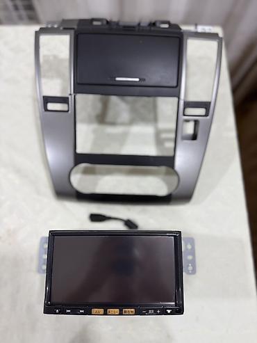 Магнитолы: Nissan Tiida 2011 Original Zavodskoy Monitor + Çərçivə Nissan Tiida — 1