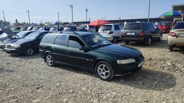 техпаспорт авто: Opel Vectra: 1999 г., 1.8 л, Механика, Бензин, Универсал