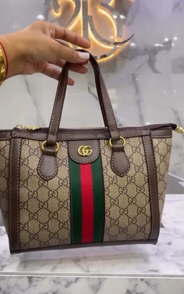 сумка для ноутбука: Gucci üslubunda monoqram naxışlı çanta - Korpus: bej rəngli GG