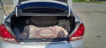 motor bmw: Nissan Sunny: 1.3 l | 2008 il Sedan — 7