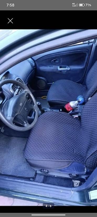 акуммулятор: Mitsubishi Carisma: 1999 г., Механика, Бензин, Седан — 4