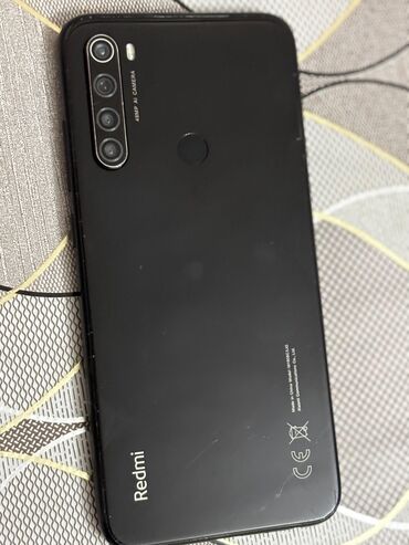 z filip 5: Xiaomi Redmi smartfon - Arxa tərəfində “Redmi” loqosu, barmaq izi