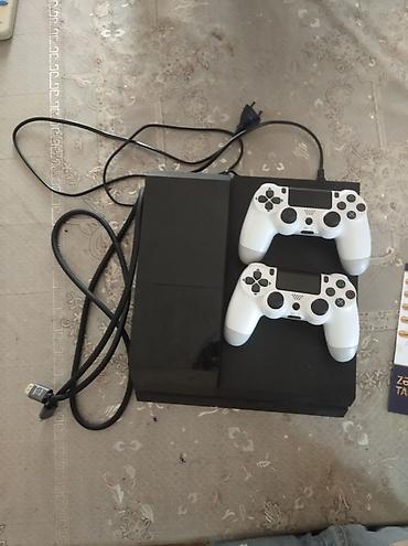 irşad iphone 11 pro: PlayStation 4 (PS4) oyun konsolu 2TB yaddaşı var prasifka modeldir — 1