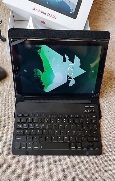 Tableti: GOODTEL Android tablet – komplet sa dodatnom opremom Opis: - Tablet — 23