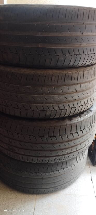 Автомобильные масла: Шина Continental 235 / 45 / R 18