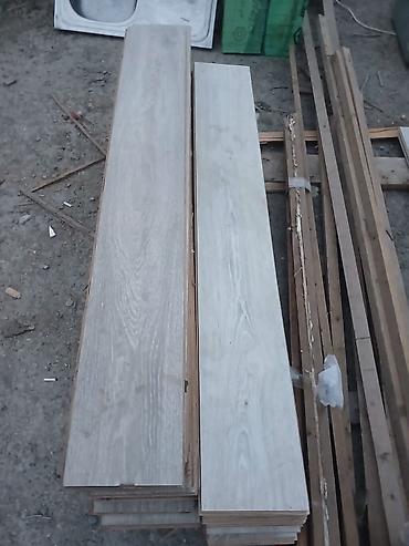 plastik qapi gence: 74 İradə Laminat 2 rendi hersi 11 kvadratdi qiyməti 1kv 5man ünvan — 1