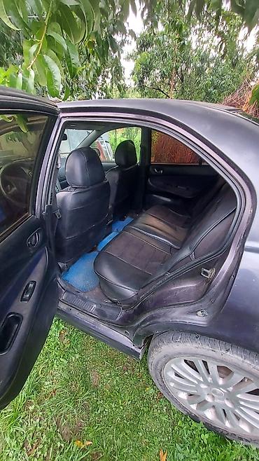 каракол мото: Mitsubishi Galant: 2002 г. — 8
