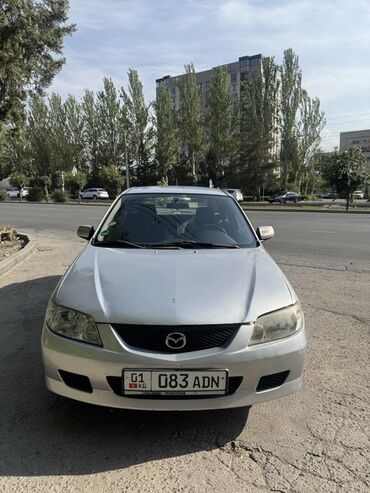 авто машина сатып алам: Серебристый седан Mazda, подходящий для повседневного использования