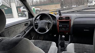 Mazda: Mazda Capella: 1999 г., 1.8 л, Механика, Бензин, Универсал — 14