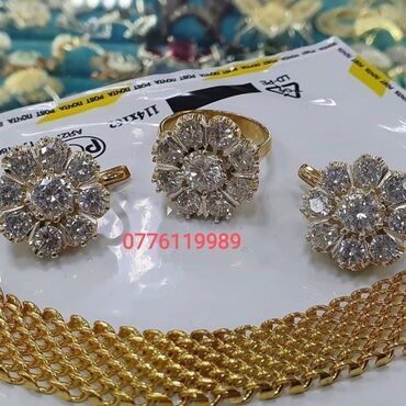 Zərgərlik dəstləri: Dəstə daxildir: Üzük, Sırğa, Gümüş — 7