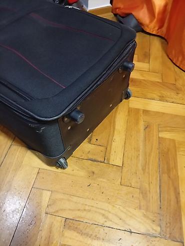 Putni koferi i torbe: Veliki kofer na točkiće sa teleskopskom ručkom. oko 75 50 30 — 7