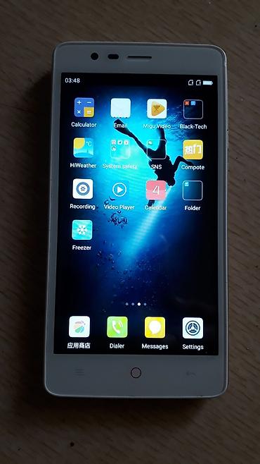 redmi a55: Смартфон Xiaolajiao (логотип с перчиком), бело‑серебристый корпус. б/у — 1