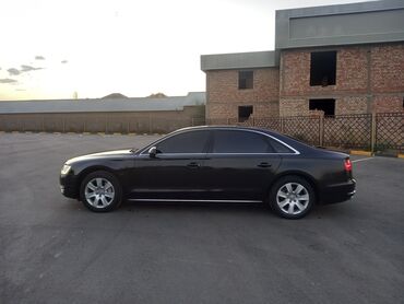 ауди рс7 цена бишкек: Черный седан Audi A8, характеризующийся элегантным силуэтом и