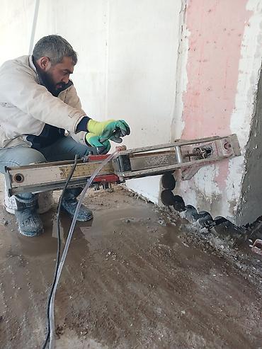 Digər tikinti xidmətləri: Dəmir-beton və kərpic divarlarda qapı-pəncərə açılışlarının kəsilməsi — 19