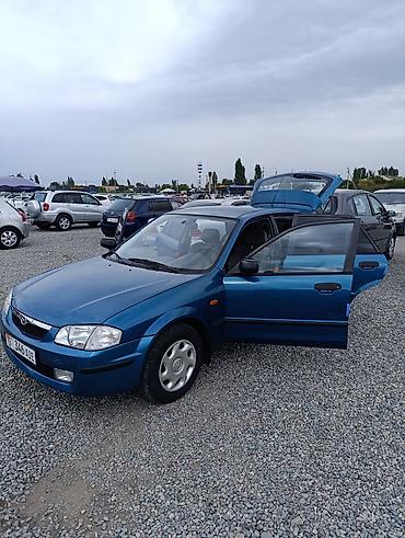 mazda авто: Mazda 323: 1999 г., 1.5 л, Автомат, Бензин, Универсал — 10
