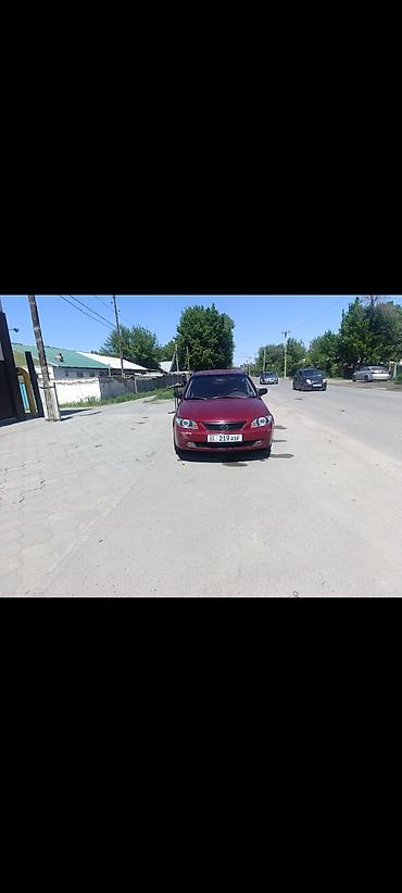 обмен на квартиры: Mazda 323: 2001 г., 1.8 л, Автомат, Бензин, Седан — 3