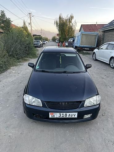 машинка б у: Mazda 323: 1999 г., 1.6 л, Механика, Бензин, Седан — 9