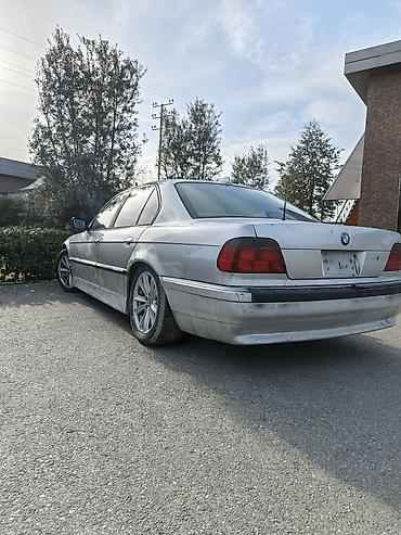 bmw f10 lip: BMW 7 Series sedan (E38), gümüş rəngli, 4 qapılı, arxa ötürücülü — 5
