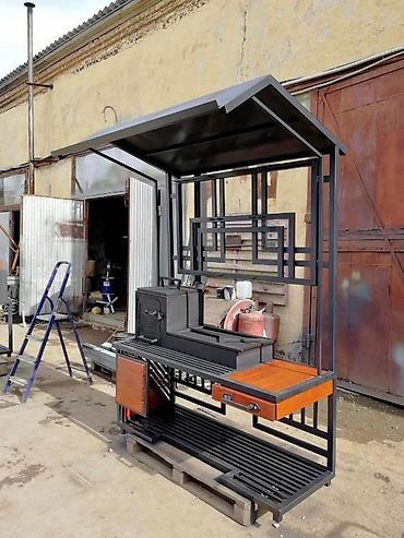 odun taxta: Damlı, çoxfunksiyalı metal manqal kompleksi. Bu manqal stansiyası — 1