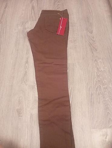 cins salvarlar kisi ucun: Qəhvəyi rəngli dar kəsimli cins şalvar. - Stil: slim/skinny kəsim, diz — 1