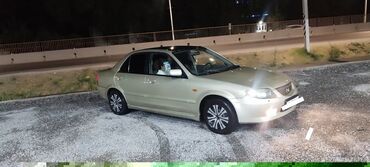 сидения спада: Mazda Familia: 2003 г., 1.6 л, Механика, Бензин, Седан